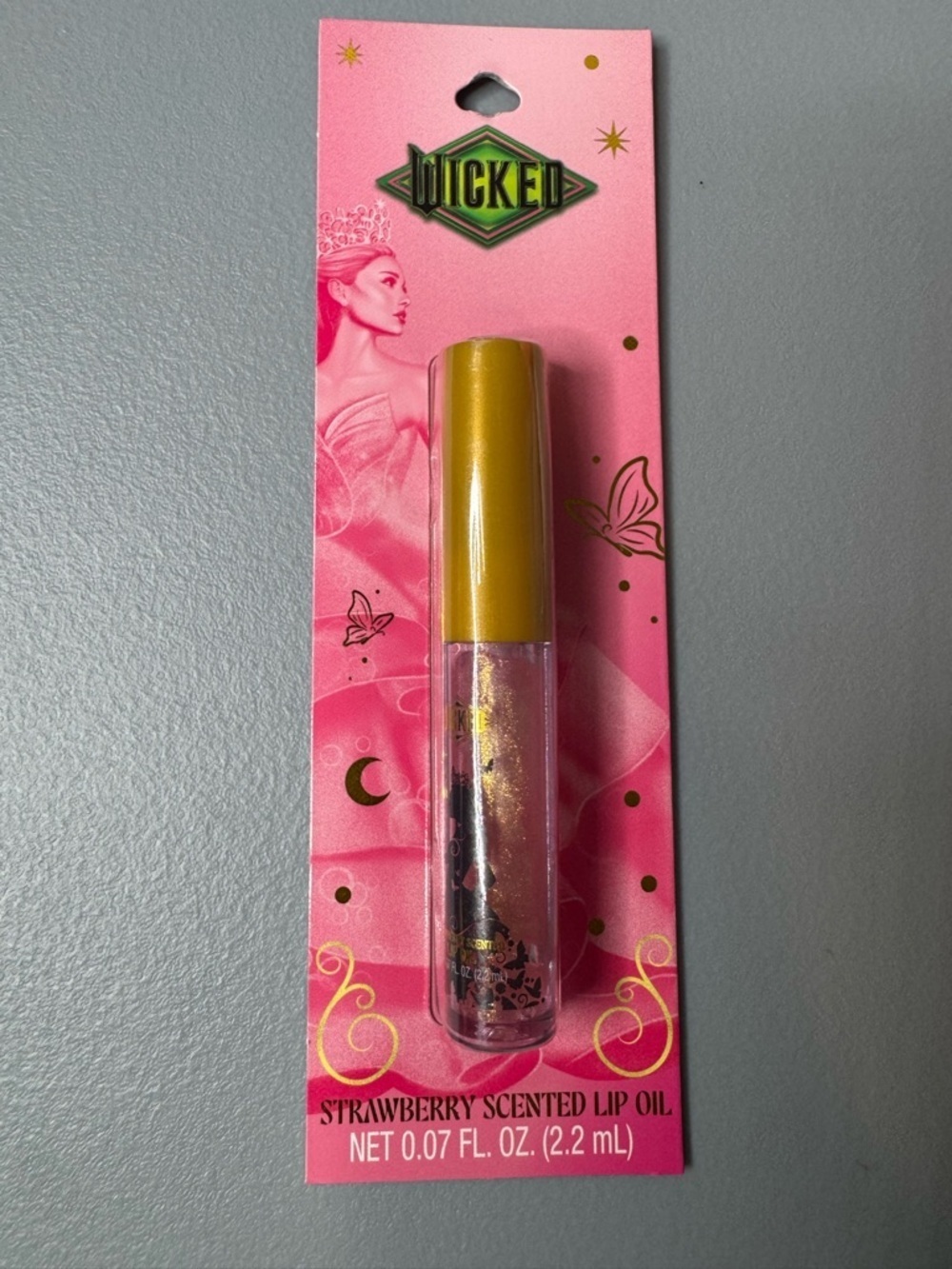 Wicked movie Glinda Strawberry Scented Lip Oil shimmer pastel pink summer